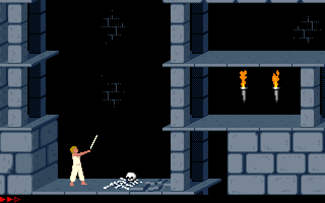 A dungeon scene from the original Prince of Persia MS-DOS version, with the prince holding a sword beside a fallen skeleton